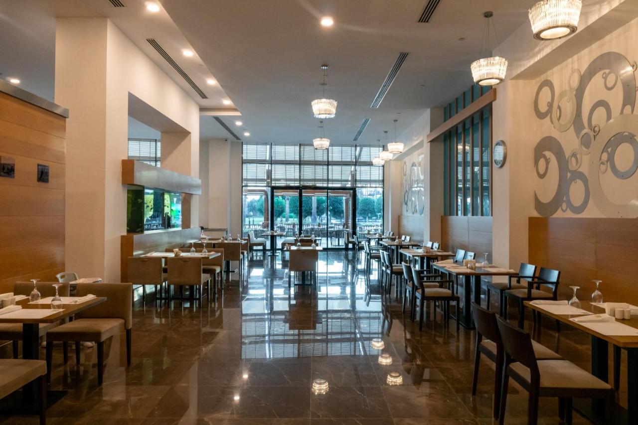 Baia Lara Hotel Анталья Экстерьер фото The restaurant at the hotel